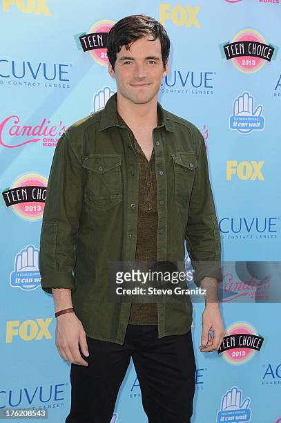 Actor Ian Harding attends the 2013 Teen Choice Awards at Gibson Amphitheatre on August 11, 2013 in Universal City, California.