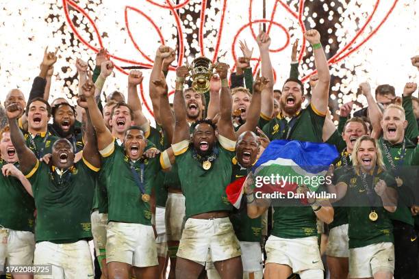 Siya Kolisi of South Africa lifts The Webb Ellis Cup following the Rugby World Cup Final match between New Zealand and South Africa at Stade de...