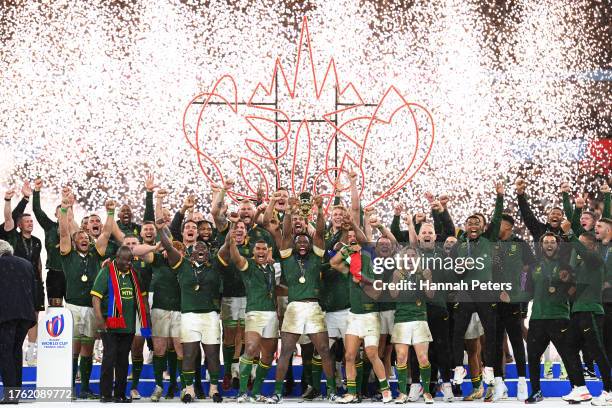 Siya Kolisi of South Africa lifts The Webb Ellis Cup following the Rugby World Cup Final match between New Zealand and South Africa at Stade de...
