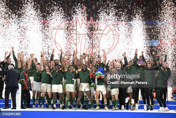 Siya Kolisi of South Africa lifts The Webb Ellis Cup following the Rugby World Cup Final match between New Zealand and South Africa at Stade de...