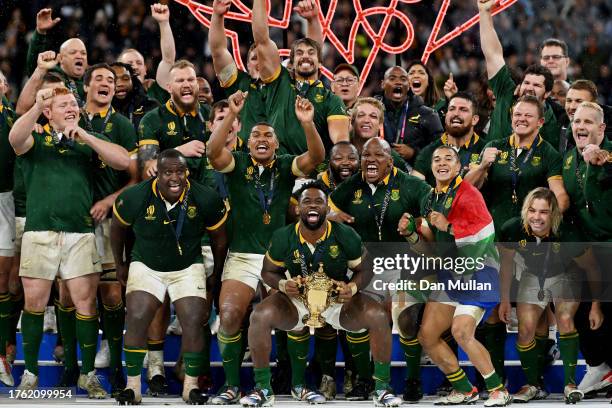 Siya Kolisi of South Africa lifts The Webb Ellis Cup following the Rugby World Cup Final match between New Zealand and South Africa at Stade de...