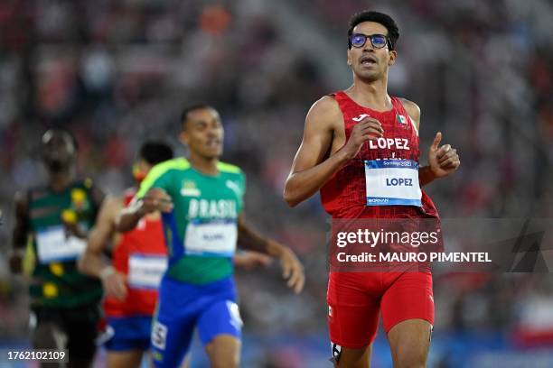 Mexico's Jesus Tonatiu Lopez Alvarez reacts after winning in the men's 800m semifinal heat 2 of the Pan American Games Santiago 2023 at the National...