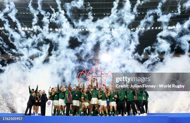 Siya Kolisi of South Africa lifts The Webb Ellis Cup following the Rugby World Cup Final match between New Zealand and South Africa at Stade de...