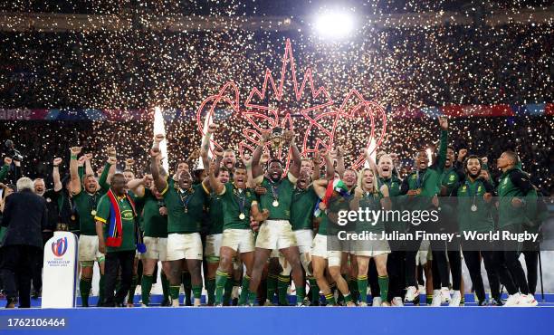 Siya Kolisi of South Africa lifts The Webb Ellis Cup following the Rugby World Cup Final match between New Zealand and South Africa at Stade de...