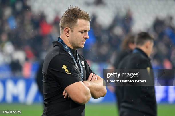 Sam Cane of New Zealand looks dejected with his runners up medal following the team's defeat during the Rugby World Cup Final match between New...