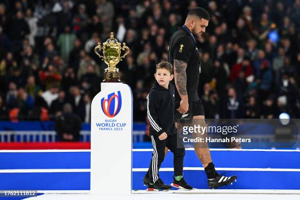 Codie Taylor of New Zealand walks past the The Webb Ellis Cup following the Rugby World Cup Final match between New Zealand and South Africa at Stade...
