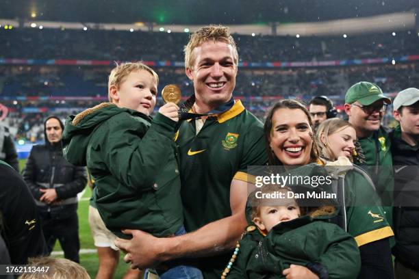 Pieter-Steph Du Toit of South Africa celebrates with his family following the team’s victory during the Rugby World Cup Final match between New...