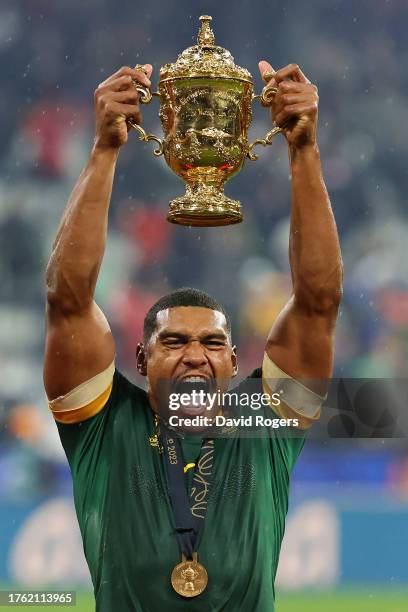 Damian Willemse of South Africa lifts the The Webb Ellis Cup following the team’s victory during the Rugby World Cup Final match between New Zealand...