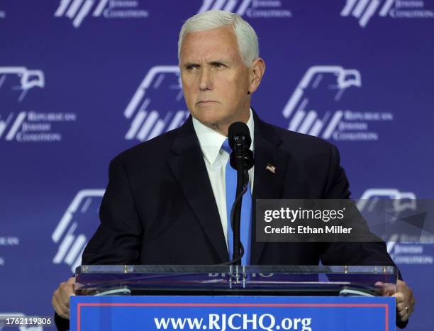 Republican presidential candidate former U.S. Vice President Mike Pence speaks after suspending his campaign for president during the Republican...