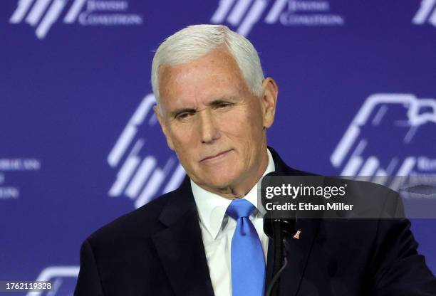 Republican presidential candidate former U.S. Vice President Mike Pence speaks after suspending his campaign for president during the Republican...