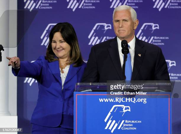 Karen Pence joins former U.S. Vice President Mike Pence onstage after he suspended his campaign for president during the Republican Jewish...