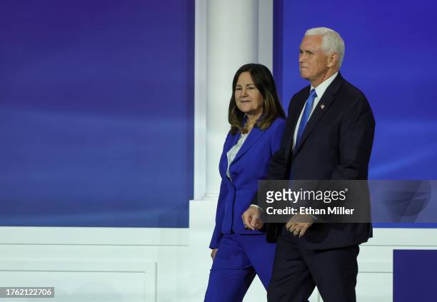 Karen Pence and former U.S. Vice President Mike Pence leave the stage after he suspended his campaign for president during the Republican Jewish...