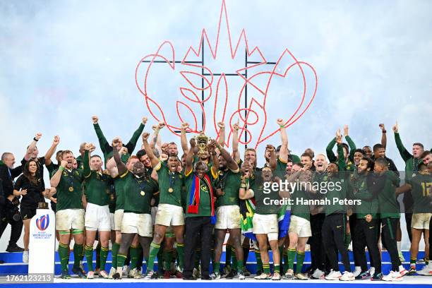 Cyril Ramaphosa, President of South Africa, lifts the The Webb Ellis Cup following the Rugby World Cup Final match between New Zealand and South...