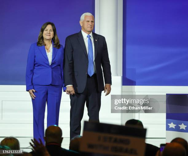 Karen Pence and former U.S. Vice President Mike Pence leave the stage after he suspended his campaign for president during the Republican Jewish...