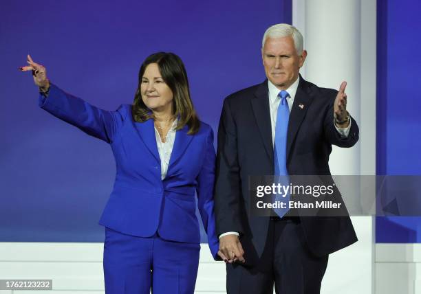 Karen Pence and former U.S. Vice President Mike Pence wave after he suspended his campaign for president during the Republican Jewish Coalition's...