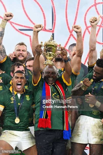 Cyril Ramaphosa, President of South Africa, lifts The Webb Ellis Cup following the Rugby World Cup Final match between New Zealand and South Africa...