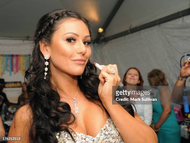 Personality Jenni 'JWOWW' Farley attends the Backstage Creations Celebrity Retreat At Teen Choice 2013 at Gibson Amphitheatre on August 11, 2013 in...