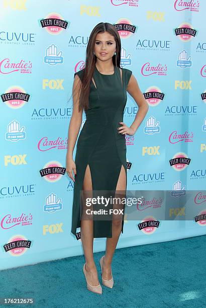 Singer Selena Gomez arrives at the Fox Teen Choice Awards 2013 held at the Gibson Amphitheatre on August 11, 2013 in Los Angeles, California.