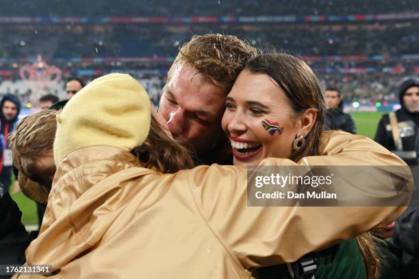 Pieter-Steph Du Toit of South Africa celebrates with his family after defeating New Zealand during the Rugby World Cup Final match between New...