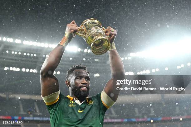 Siya Kolisi of South Africa celebrates with The Webb Ellis Cup following the Rugby World Cup Final match between New Zealand and South Africa at...