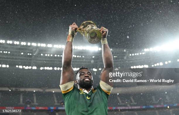 Siya Kolisi of South Africa celebrates with The Webb Ellis Cup following the Rugby World Cup Final match between New Zealand and South Africa at...