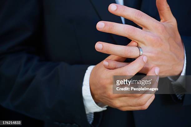 loving his ring - married stock pictures, royalty-free photos & images