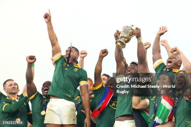 Siya Kolisi of South Africa lifts The Webb Ellis Cup following the Rugby World Cup Final match between New Zealand and South Africa at Stade de...