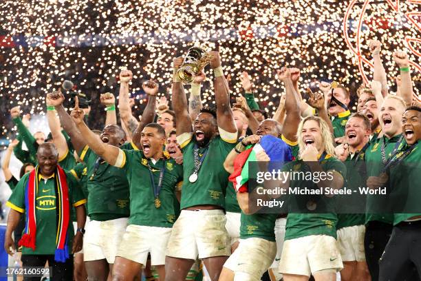 Siya Kolisi of South Africa lifts the The Webb Ellis Cup following the Rugby World Cup Final match between New Zealand and South Africa at Stade de...