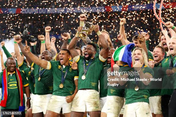 Siya Kolisi of South Africa lifts the The Webb Ellis Cup following the Rugby World Cup Final match between New Zealand and South Africa at Stade de...
