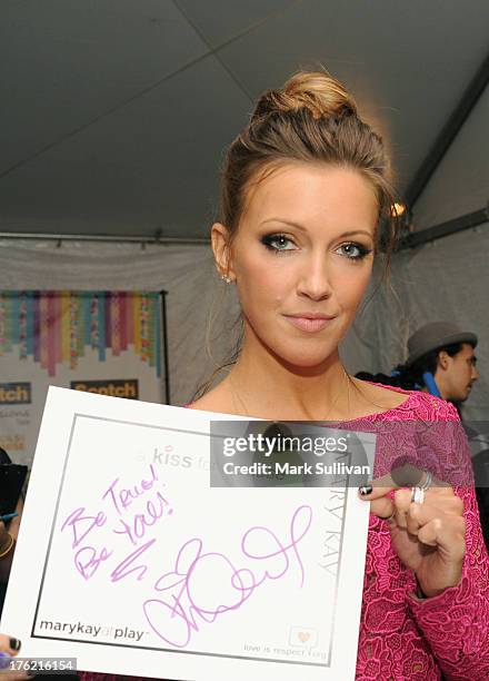 Actress Katie Cassidy attends the Backstage Creations Celebrity Retreat At Teen Choice 2013 at Gibson Amphitheatre on August 11, 2013 in Universal...