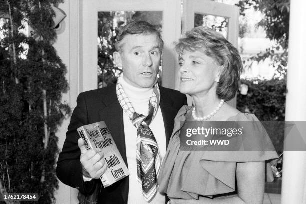 Roddy McDowall and Judith Green attend a party in Beverly Hills, California, on June 25, 1987.