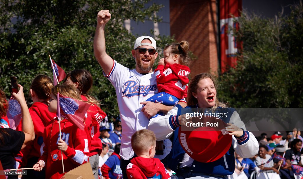 Texas Ranger Ride On Red Ian Kennedy of the Texas Rangers cheers as he and his family ride in ...