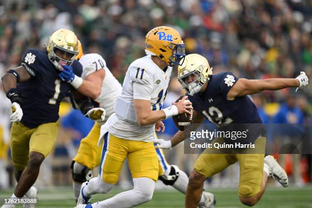 Christian Veilleux of the Pittsburgh Panthers scrambles in the second half against the Notre Dame Fighting Irish at Notre Dame Stadium on October 28,...
