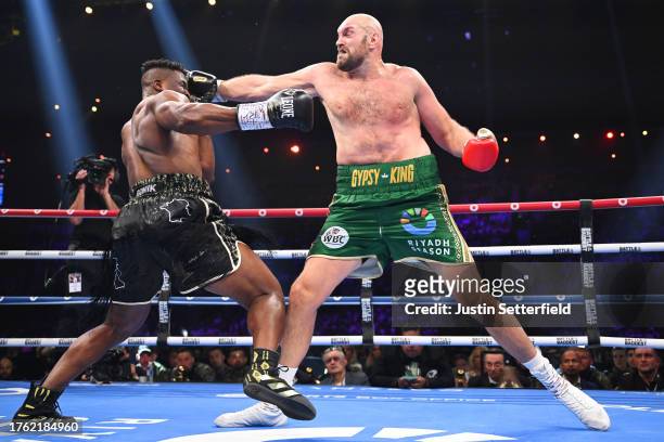 Tyson Fury punches Francis Ngannou during the Heavyweight fight between Tyson Fury and Francis Ngannou at Boulevard Hall on October 28, 2023 in...