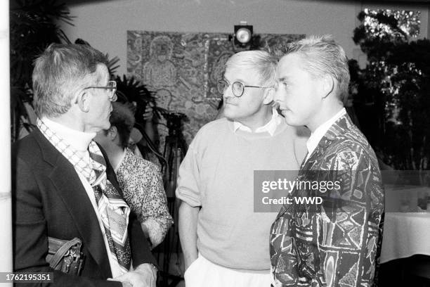 Roddy McDowall and David Hockney attend a party in Beverly Hills, California, on June 25, 1987.