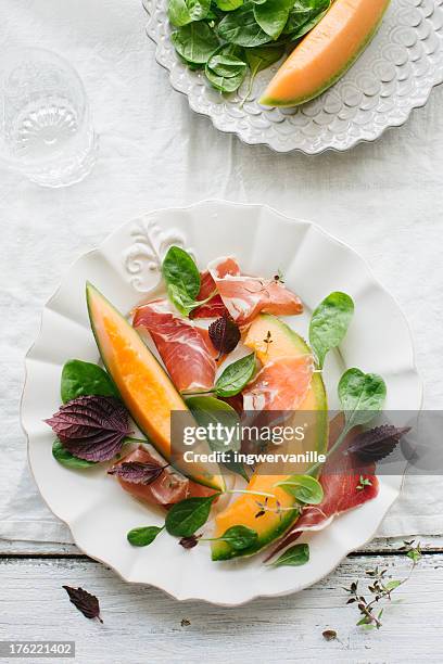 prosciutto & melon salad - prosciutto stock pictures, royalty-free photos & images