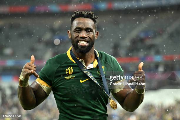 Siya Kolisi of South Africa celebrates following the team’s victory in the Rugby World Cup Final match between New Zealand and South Africa at Stade...