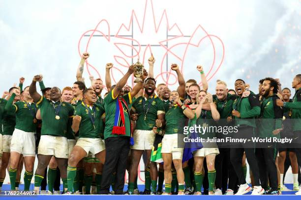 Cyril Ramaphosa, President of South Africa, lifts The Webb Ellis Cup following the Rugby World Cup Final match between New Zealand and South Africa...