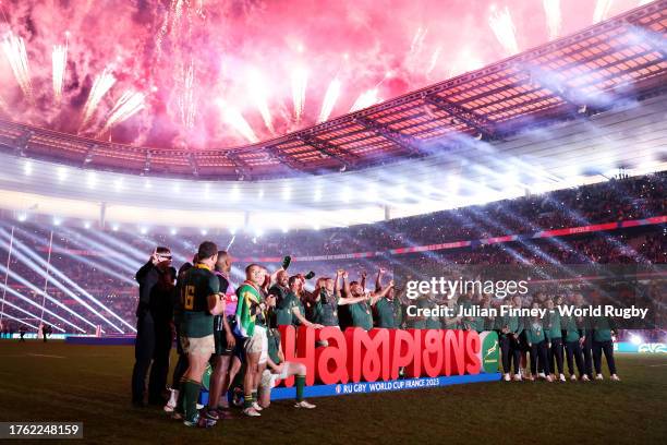 The players of South Africa celebrate victory during the firework display following the Rugby World Cup Final match between New Zealand and South...