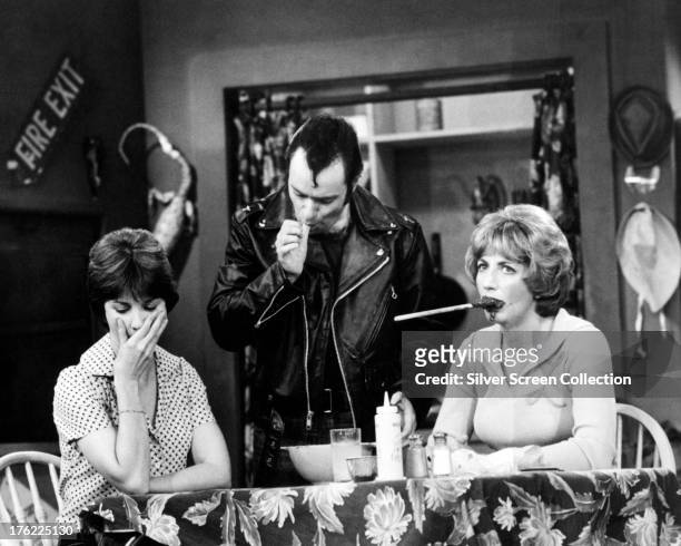 American actresses Penny Marshall , as Laverne De Fazio, and Cindy Williams as Shirley Feeney, with David Lander as Sqiggy, in the American TV sitcom...