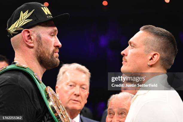 Tyson Fury and Oleksandr Usyk face off after the Heavyweight fight between Tyson Fury and Francis Ngannou at Boulevard Hall on October 28, 2023 in...