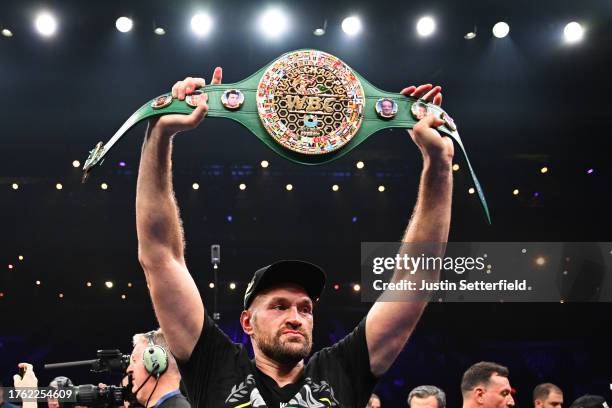 Tyson Fury holds up his WBC World Heavyweight belt after victory in the Heavyweight fight between Tyson Fury and Francis Ngannou at Boulevard Hall on...