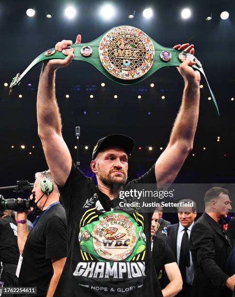 Tyson Fury holds up his WBC World Heavyweight belt after victory in the Heavyweight fight between Tyson Fury and Francis Ngannou at Boulevard Hall on...