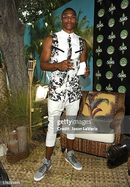 Player Russell Westbrook poses in the green room at the 2013 Teen Choice Awards at Gibson Amphitheatre on August 11, 2013 in Universal City,...