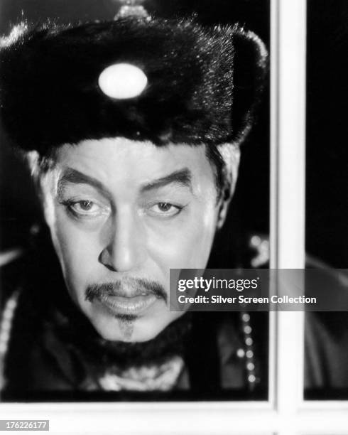 Swedish American actor Warner Oland as Charlie Chan in 'Charlie Chan At Monte Carlo', directed by Eugene Forde, 1937.