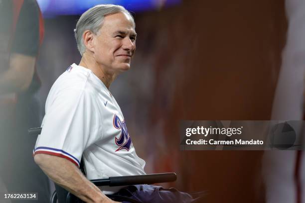 Texas governor Greg Abbott looks on before Game Two of the World Series between the Arizona Diamondbacks and the Texas Rangers at Globe Life Field on...