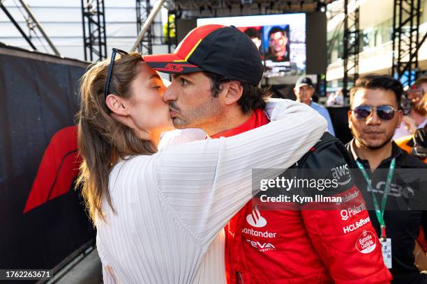 Carlos Sainz of Spain and Scuderia Ferrari and his girlfriend Rebecca Donaldson after qualifying ahead of the F1 Grand Prix of Mexico at Autodromo...