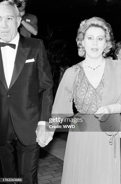 Anthony Quinn and Jolanda Addolori attend a movie premiere, part of the USA Film Festival, in Dallas, Texas, on March 27, 1981.