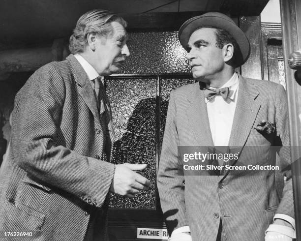 British actors Roger Livesey , as Billy Rice, and Laurence Olivier as music hall performer Archie Rice, in 'The Entertainer', directed by Tony...