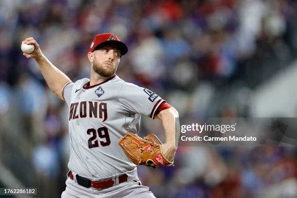 Merrill Kelly of the Arizona Diamondbacks pitches in the first inning against the Texas Rangers during Game Two of the World Series at Globe Life...